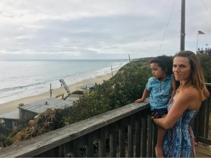 Remote working and flexibility mom with a kid by the sea